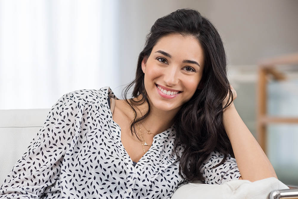 Happy young woman-1000x670