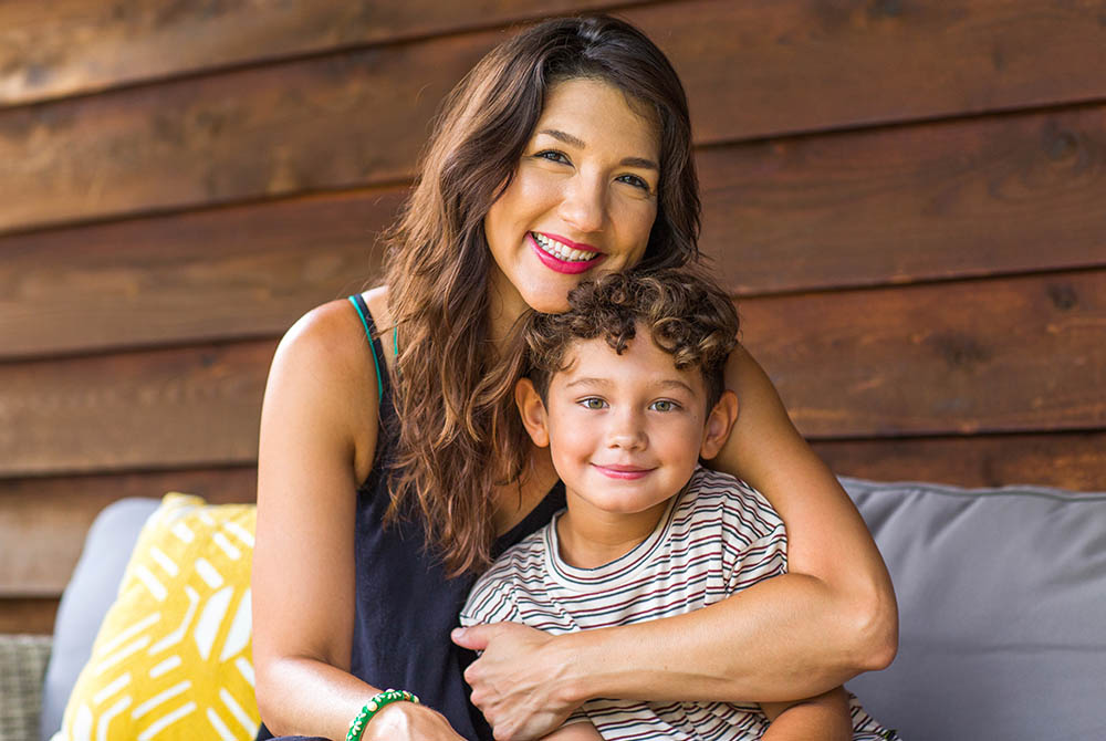 Portrait of a young Hispanic Mother and her son.-1000x670