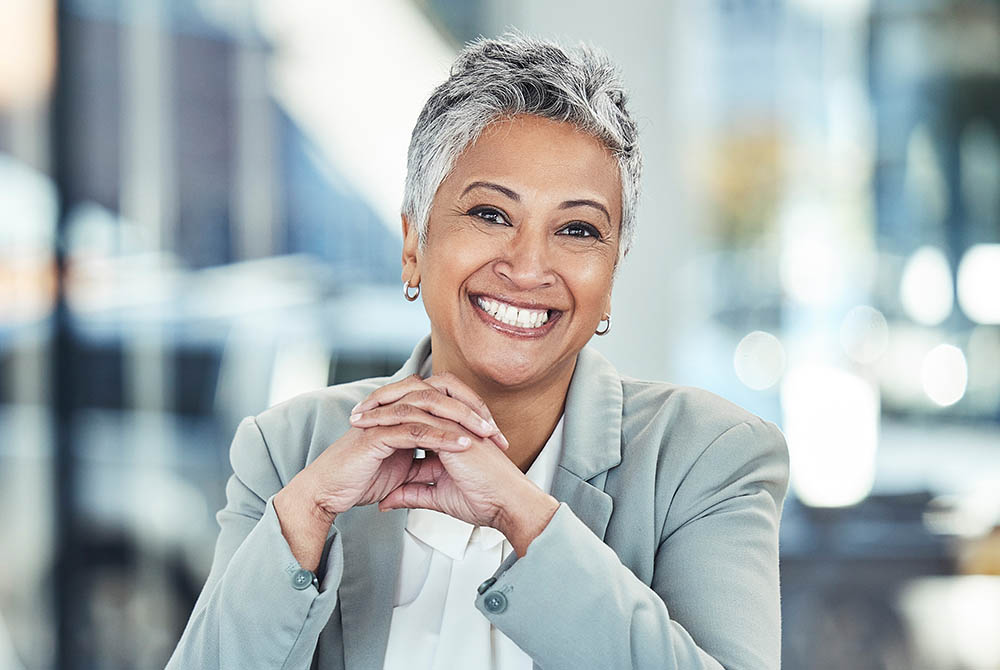 Professional, law and portrait of a woman in business, working with confidence and pride. Smile, happy and m-1000x670